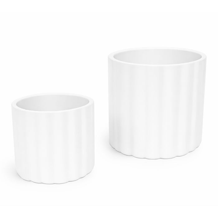Two white ceramic planters on a white background