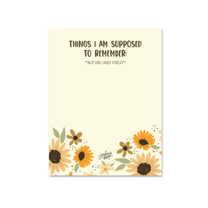 Notebook with sunflower design and text on a white background