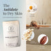 Bathorium Crush packaging with a woman relaxing in a bathtub, chamomile flower, and oats.