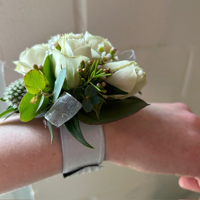 Corsage with white Spray Rose and Thistle on slaplet bracelet 