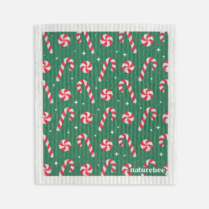 Green fabric with candy cane pattern and 'naturebee' branding on a white background