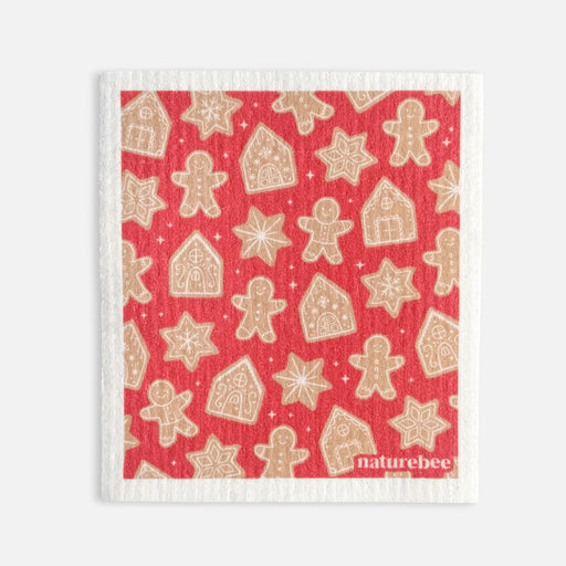 Red towel with gingerbread pattern and 'naturebee' branding on a white background