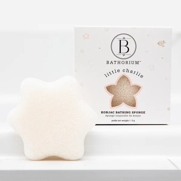 Konjac bathing sponge with packaging on a white background