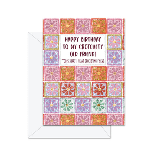 Greeting card with colorful crochet pattern and humorous birthday message on a white background