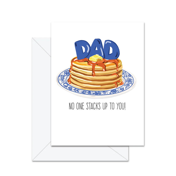 Greeting card with pancakes and 'DAD' text on a white background