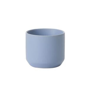 Blue ceramic cup on a white background