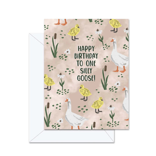 Birthday card with goose illustrations and text on a patterned background