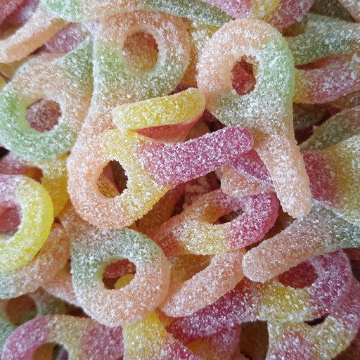 close up of sour soother candy gummy rings