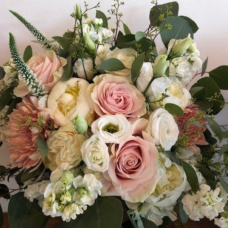 Floral bouquet with soft and muted flowers